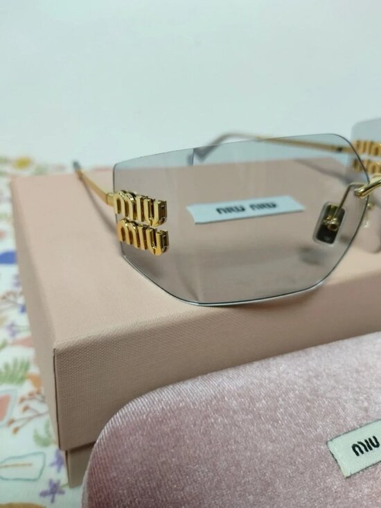 ✨ Miu Miu Rimless Grey Sunglasses with Gold Logo Detail main image 4